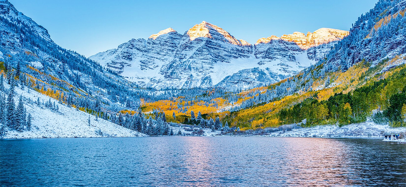 maroon bells covered in snow in fall