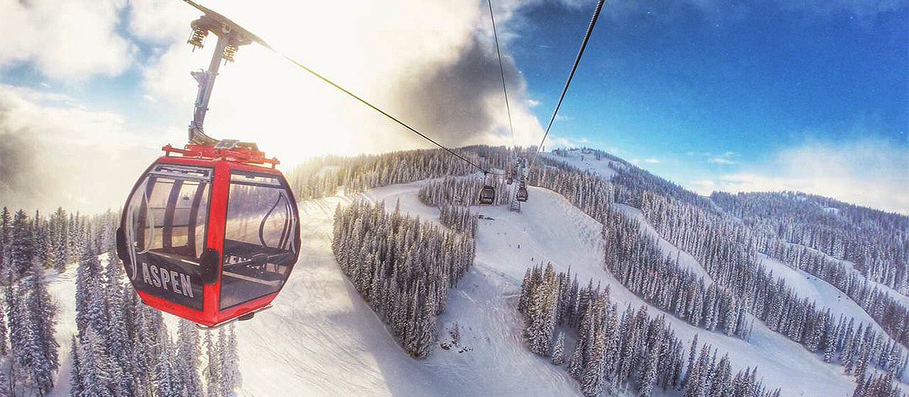 Gondola Ride looking over Aspen Mountain during winter in Aspen, Colorado